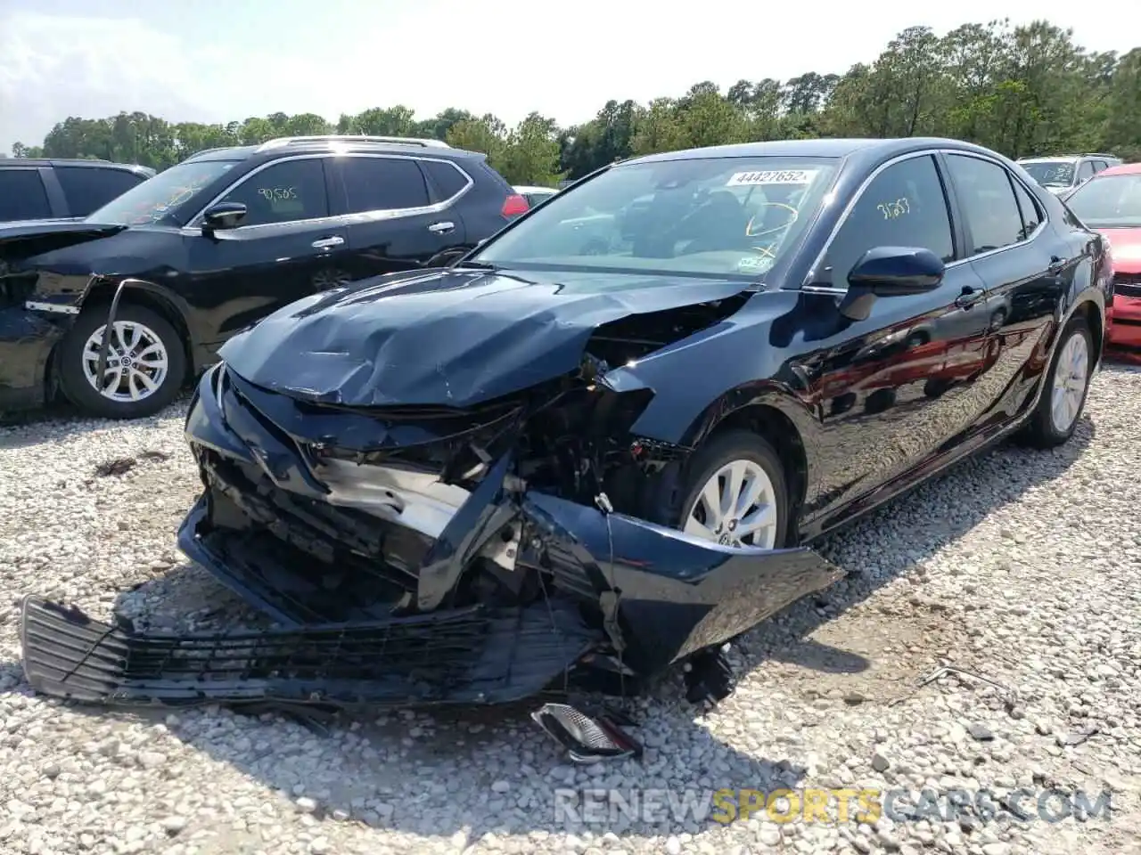 2 Photograph of a damaged car 4T1B11HK2KU721820 TOYOTA CAMRY 2019