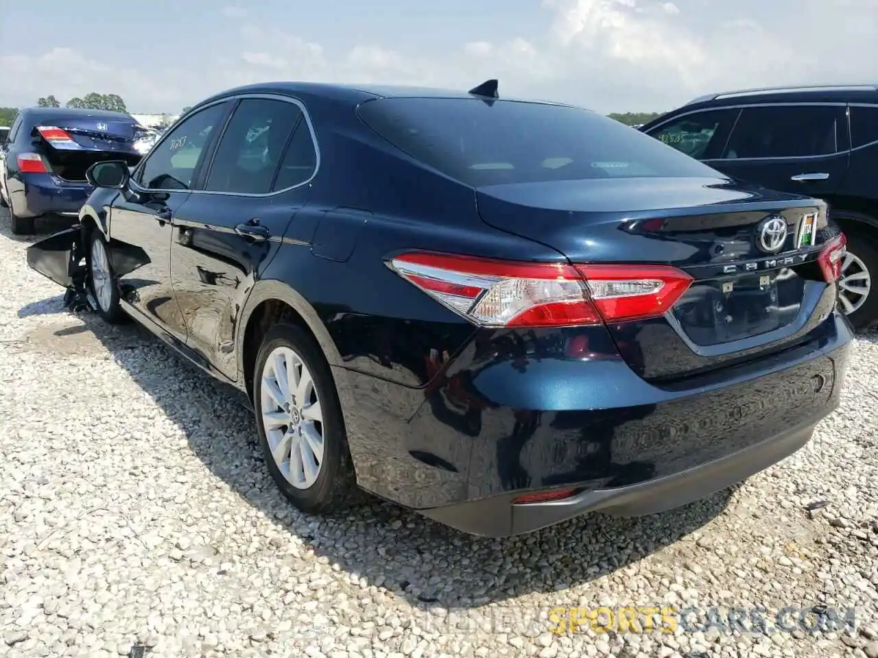 3 Photograph of a damaged car 4T1B11HK2KU721820 TOYOTA CAMRY 2019