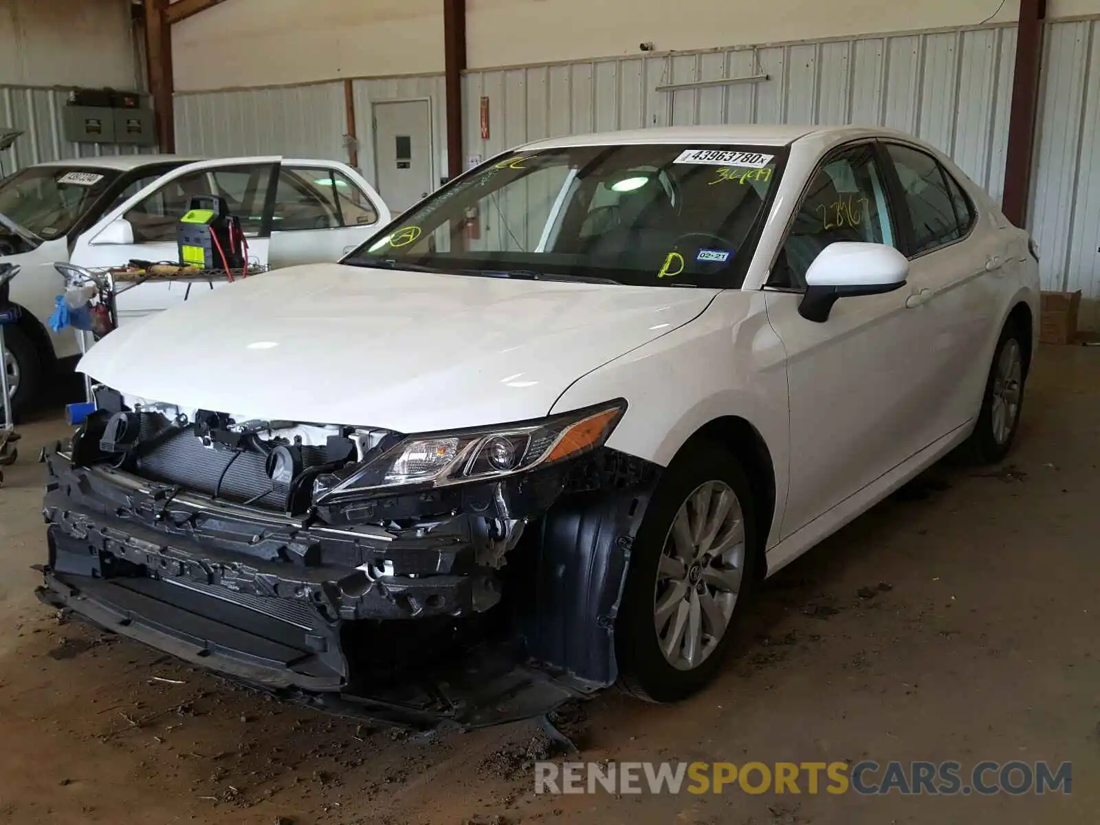 2 Photograph of a damaged car 4T1B11HK2KU723499 TOYOTA CAMRY 2019