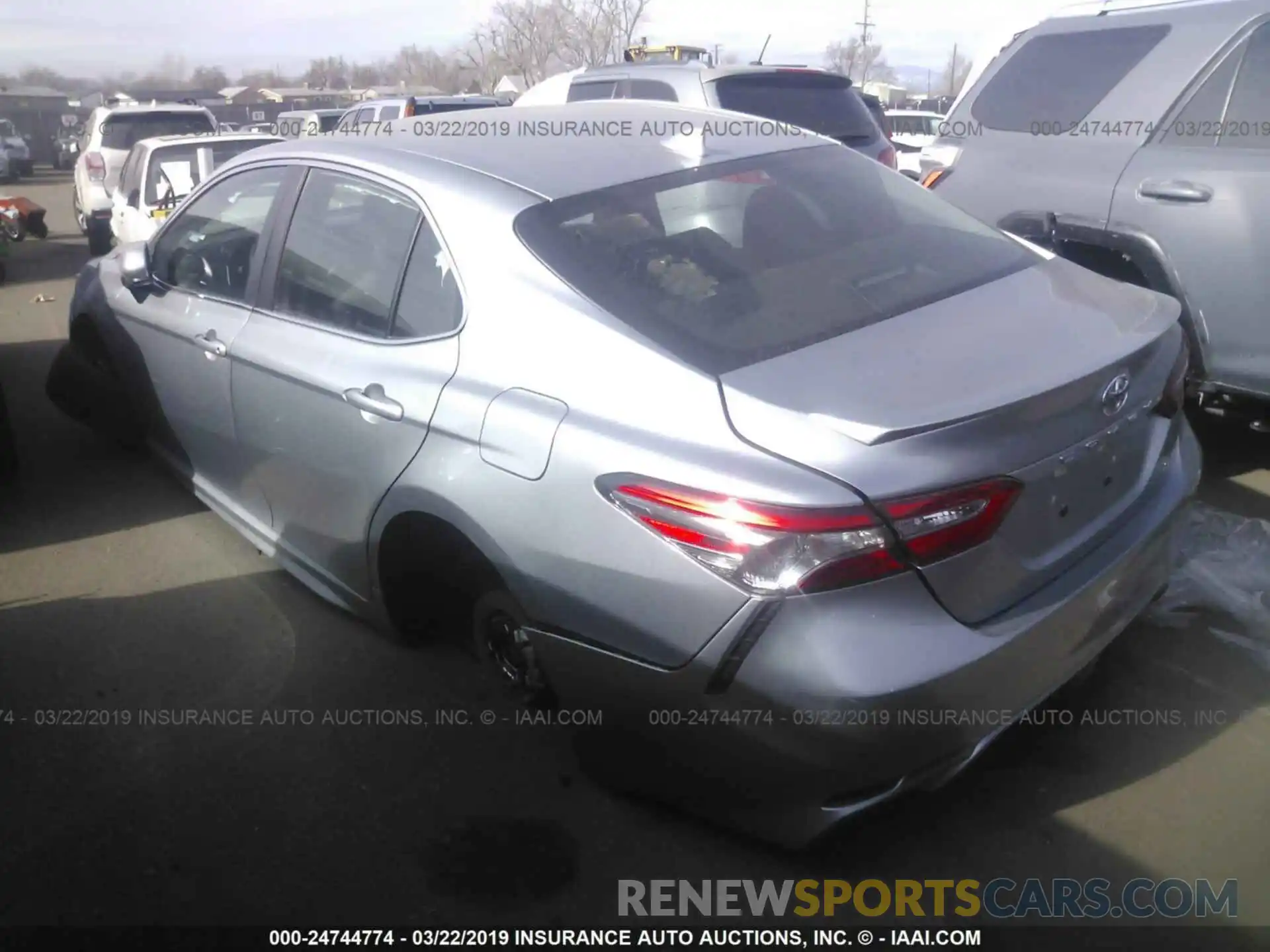 3 Photograph of a damaged car 4T1B11HK2KU723504 TOYOTA CAMRY 2019