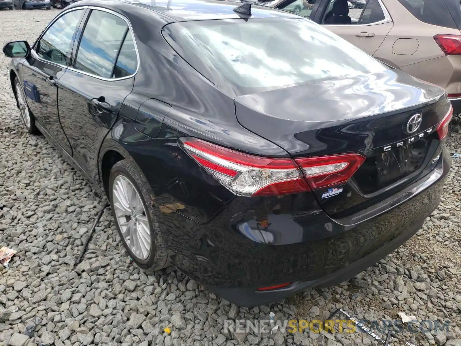 3 Photograph of a damaged car 4T1B11HK2KU725771 TOYOTA CAMRY 2019