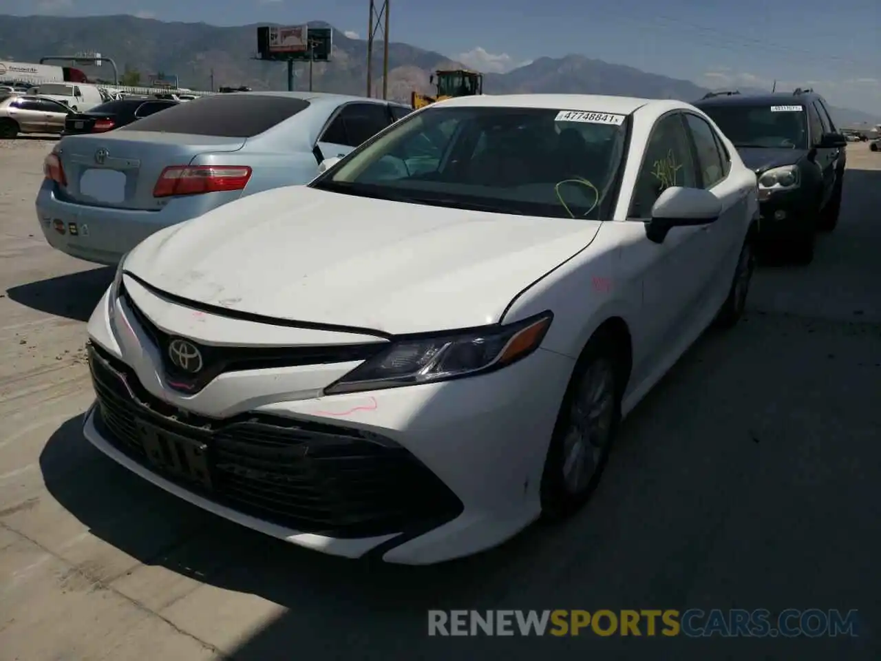 2 Photograph of a damaged car 4T1B11HK2KU728475 TOYOTA CAMRY 2019