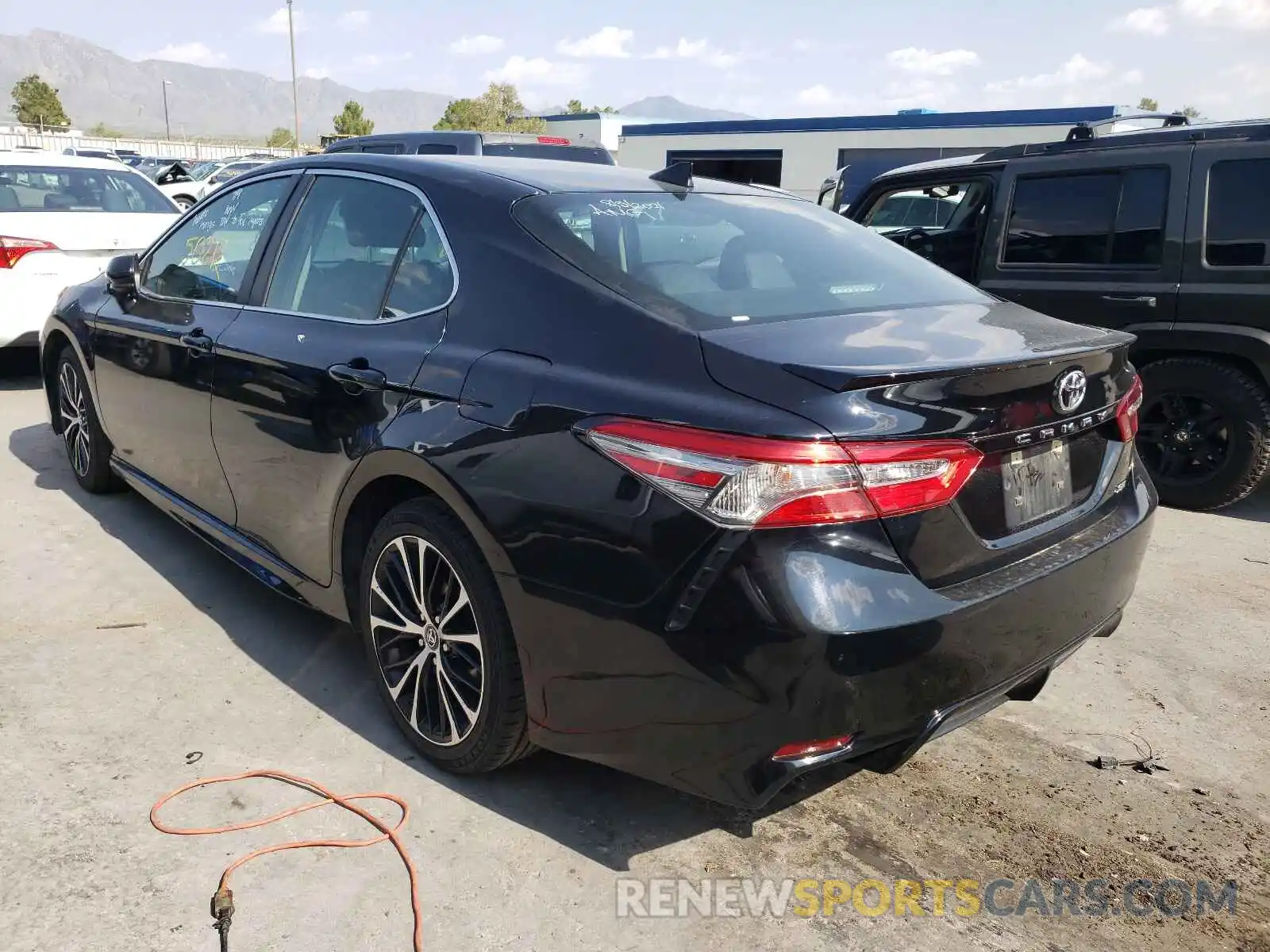 3 Photograph of a damaged car 4T1B11HK2KU729299 TOYOTA CAMRY 2019