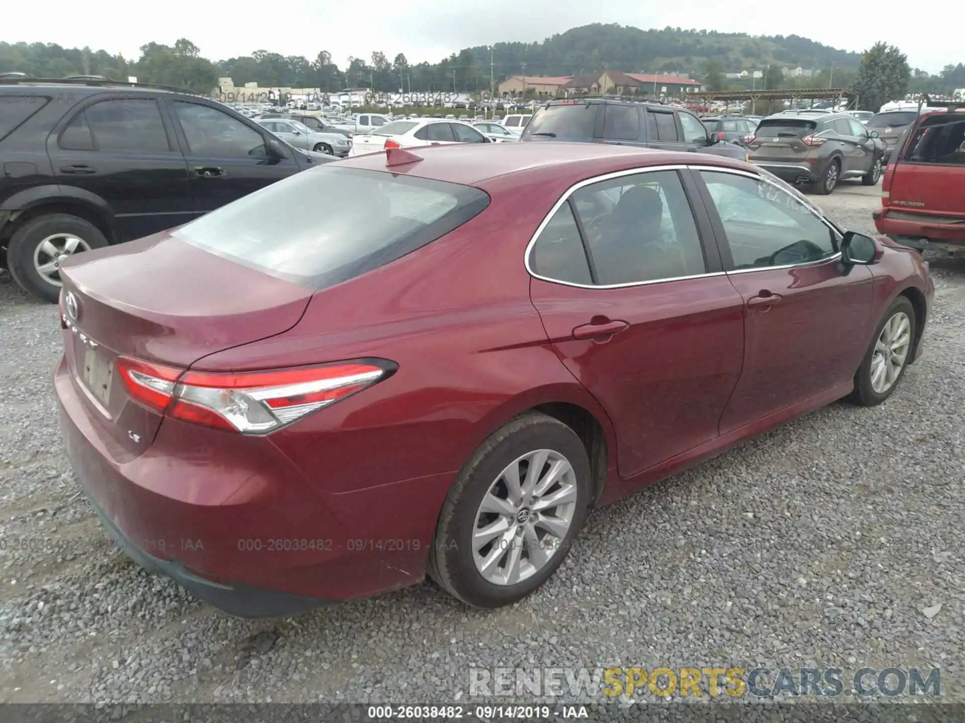 4 Photograph of a damaged car 4T1B11HK2KU733028 TOYOTA CAMRY 2019