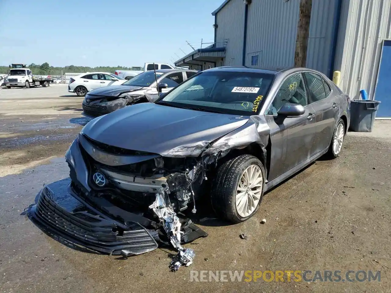 2 Photograph of a damaged car 4T1B11HK2KU734311 TOYOTA CAMRY 2019