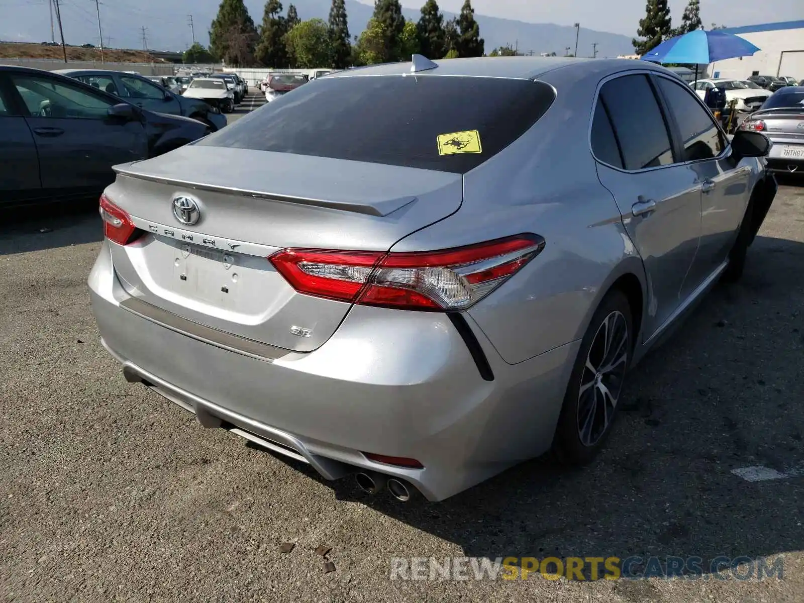 4 Photograph of a damaged car 4T1B11HK2KU737600 TOYOTA CAMRY 2019