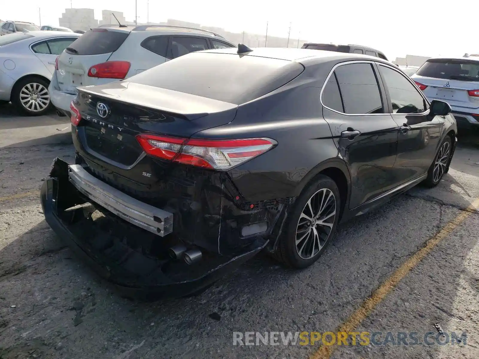 4 Photograph of a damaged car 4T1B11HK2KU737631 TOYOTA CAMRY 2019