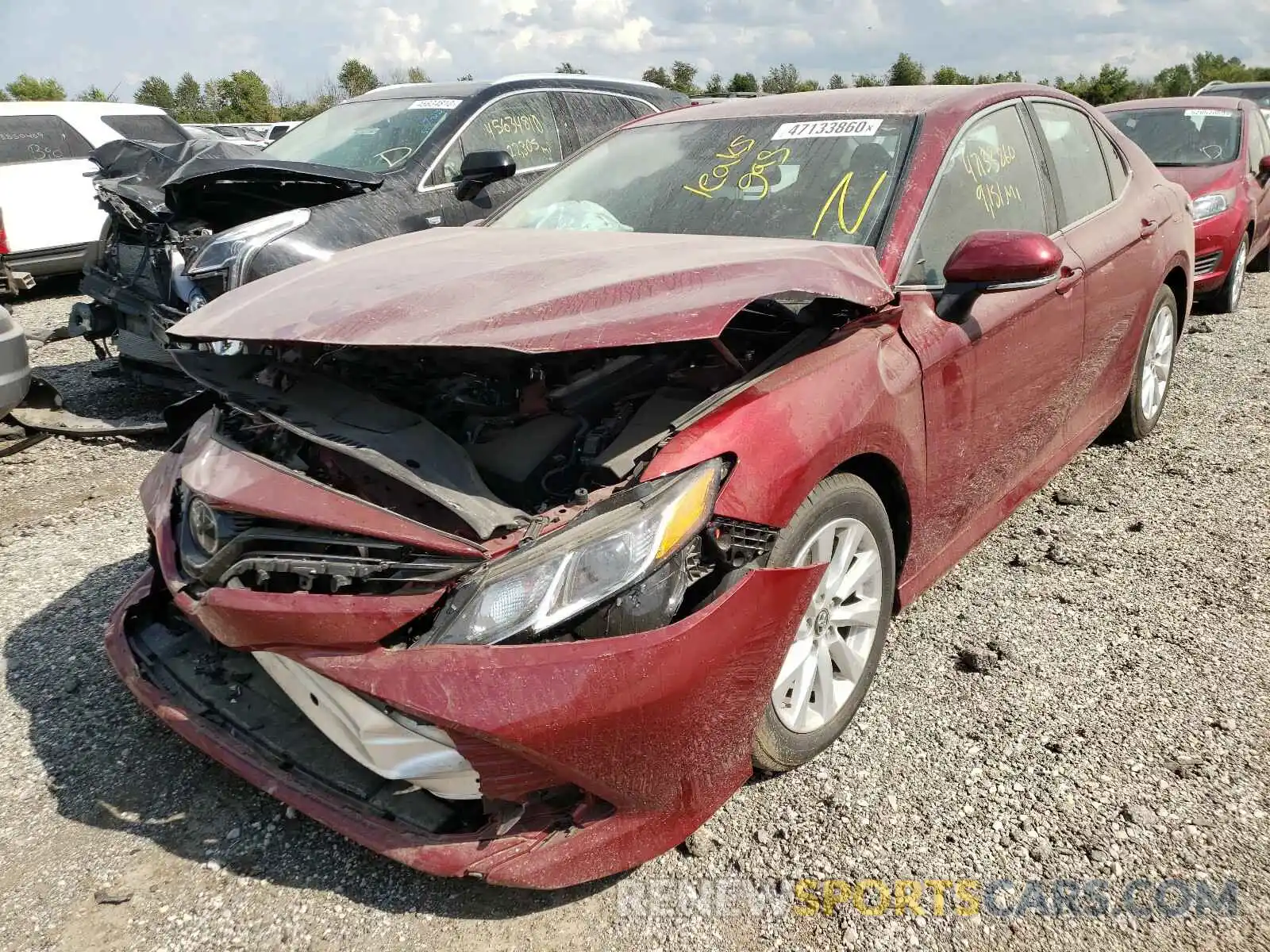 2 Photograph of a damaged car 4T1B11HK2KU738374 TOYOTA CAMRY 2019