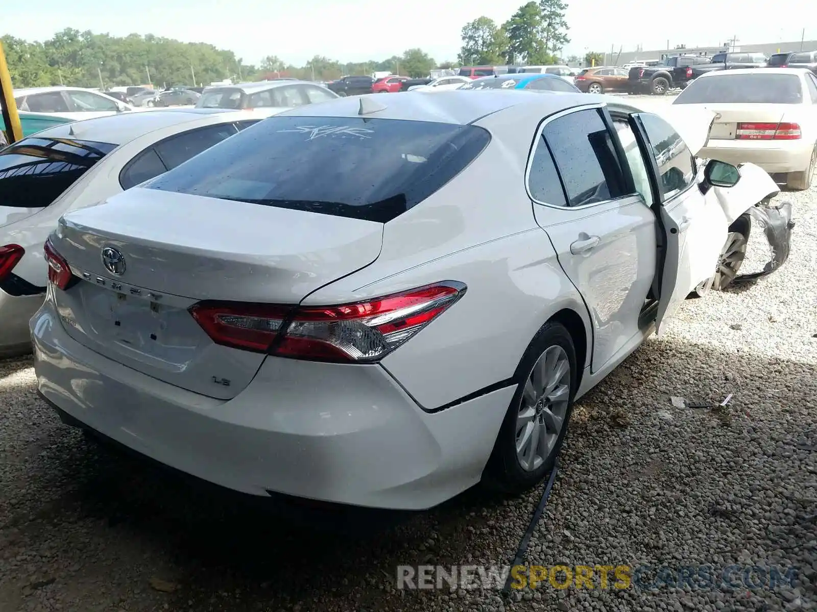 4 Photograph of a damaged car 4T1B11HK2KU739847 TOYOTA CAMRY 2019