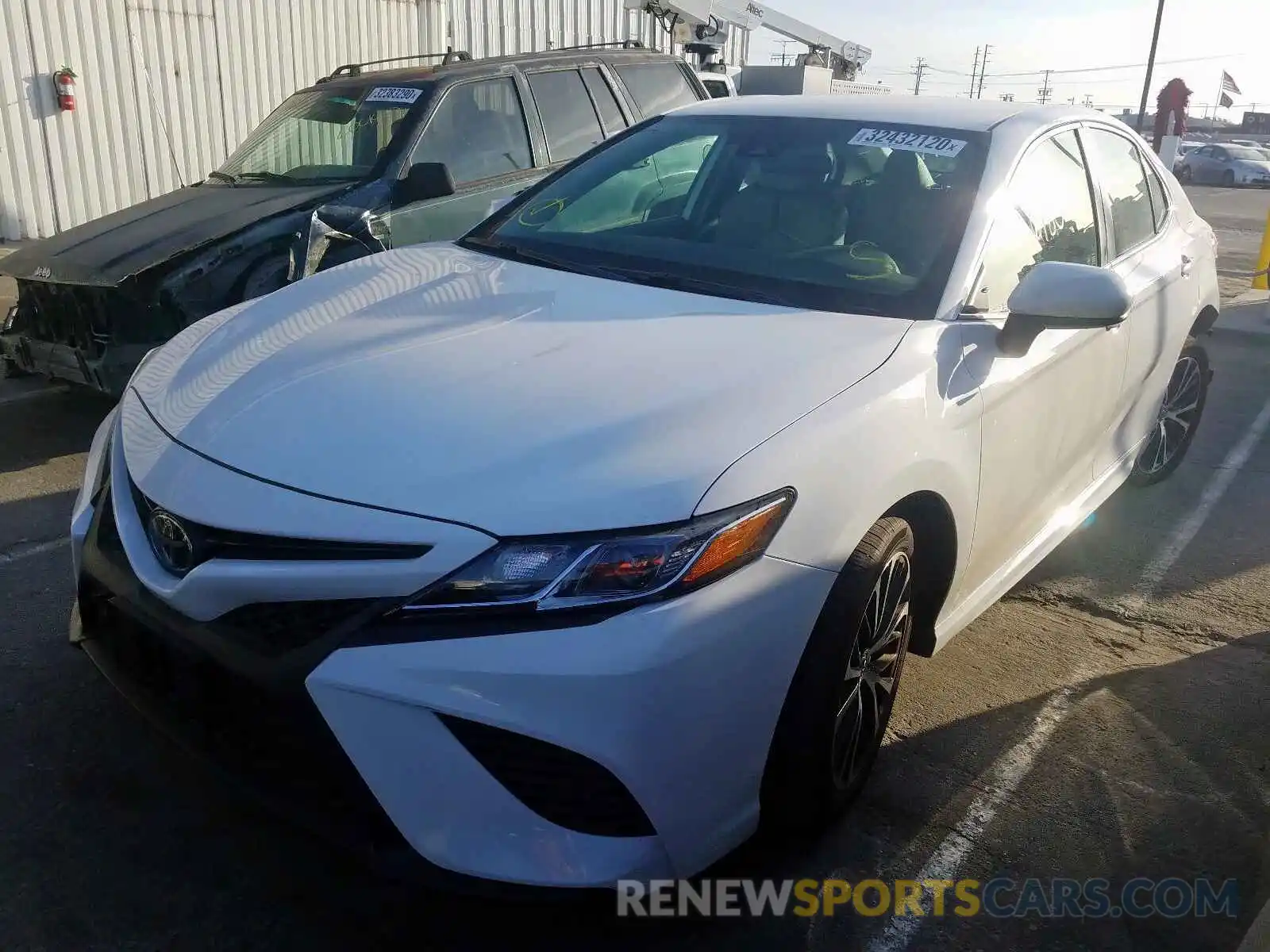 2 Photograph of a damaged car 4T1B11HK2KU740304 TOYOTA CAMRY 2019