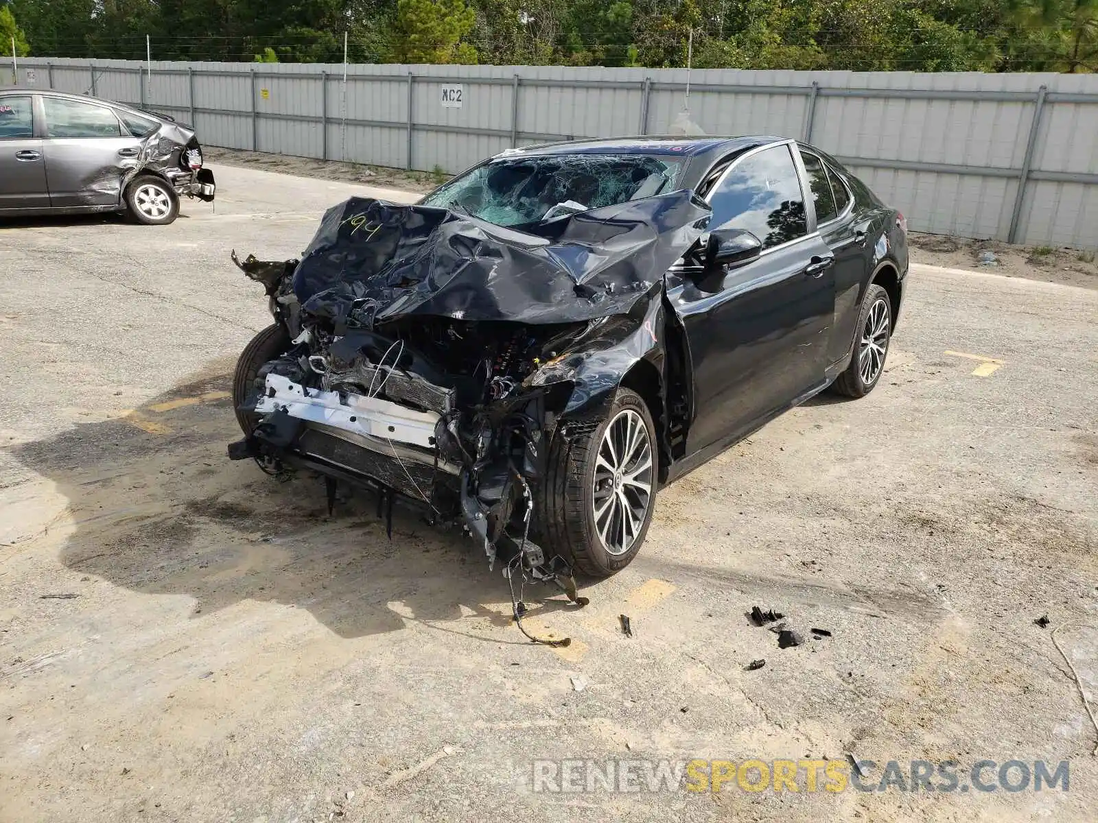 2 Photograph of a damaged car 4T1B11HK2KU741999 TOYOTA CAMRY 2019