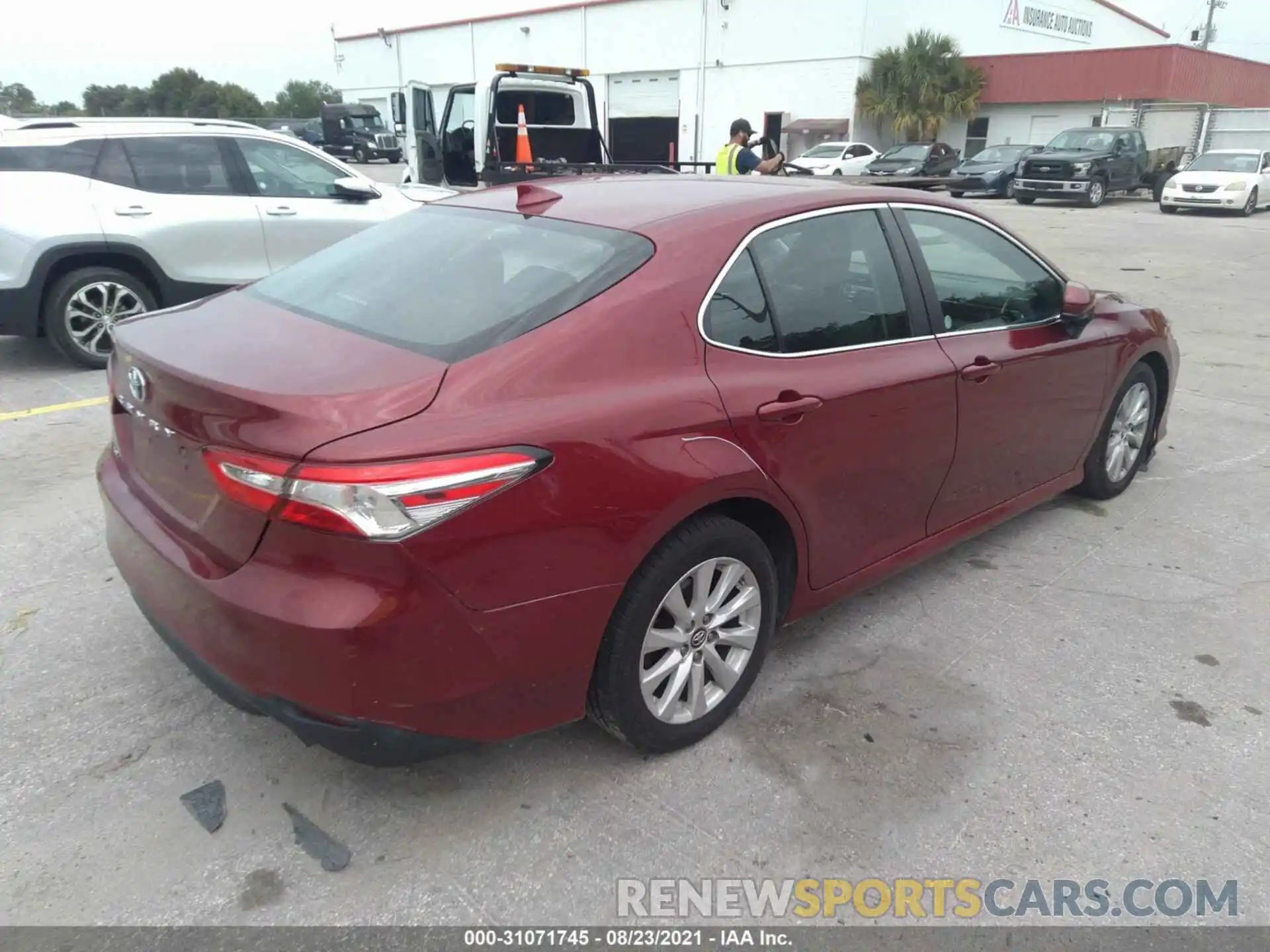 4 Photograph of a damaged car 4T1B11HK2KU742456 TOYOTA CAMRY 2019