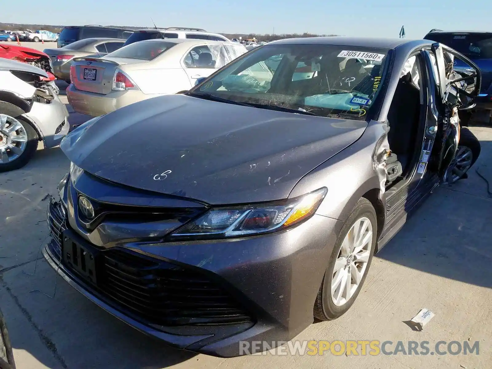 2 Photograph of a damaged car 4T1B11HK2KU742599 TOYOTA CAMRY 2019