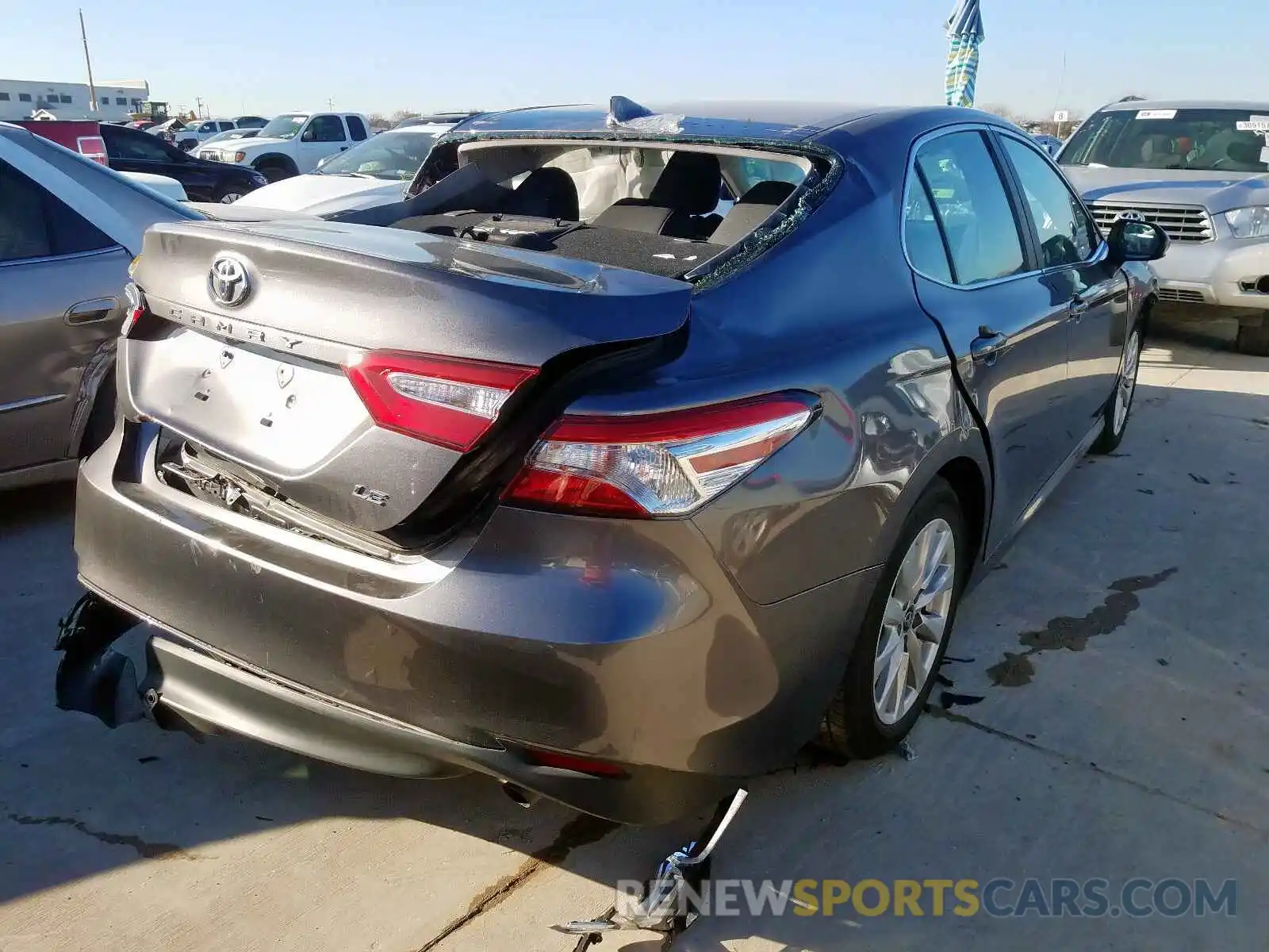 4 Photograph of a damaged car 4T1B11HK2KU742599 TOYOTA CAMRY 2019