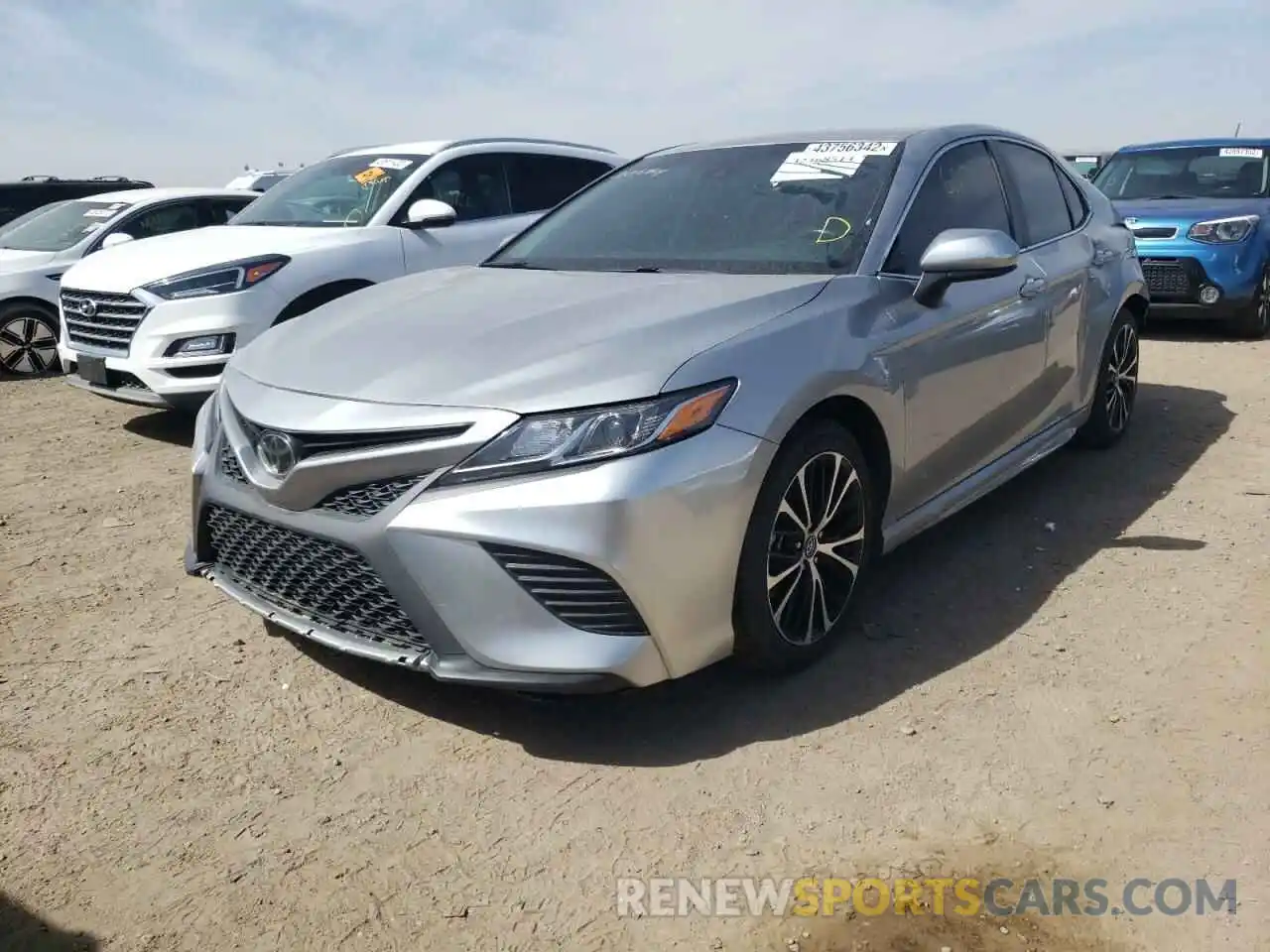 2 Photograph of a damaged car 4T1B11HK2KU743302 TOYOTA CAMRY 2019