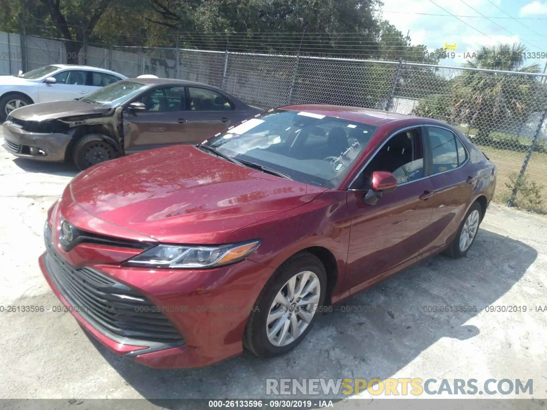 2 Photograph of a damaged car 4T1B11HK2KU746023 TOYOTA CAMRY 2019