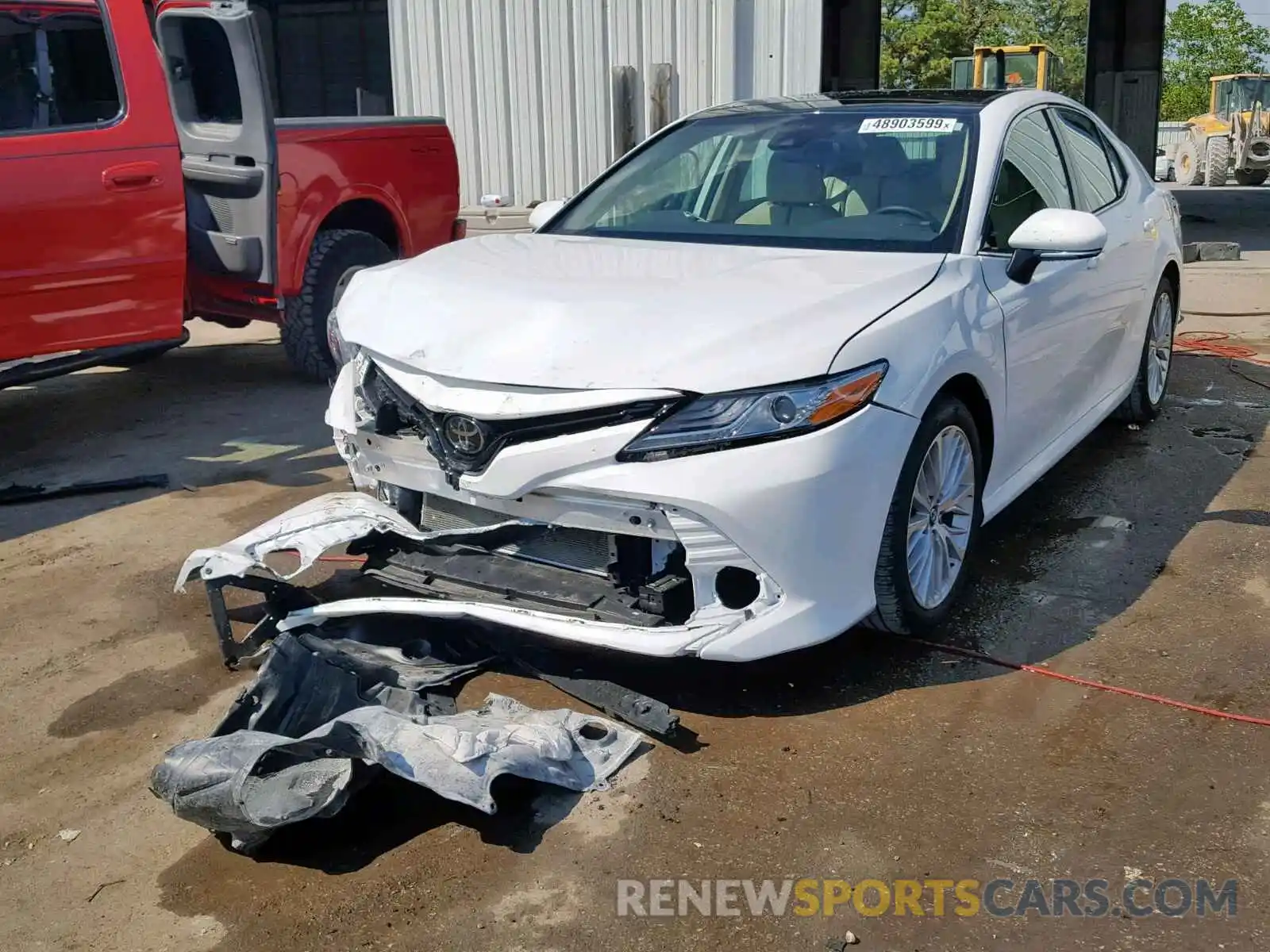 2 Photograph of a damaged car 4T1B11HK2KU752002 TOYOTA CAMRY 2019