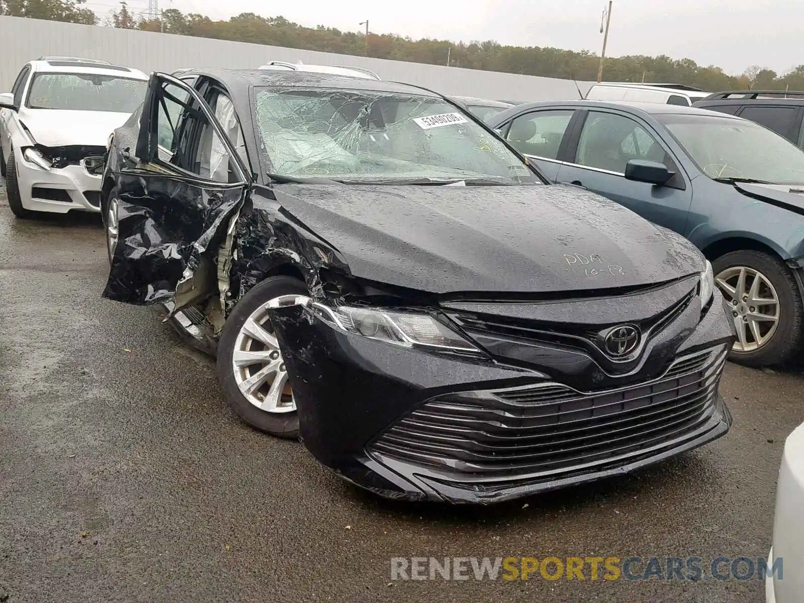 1 Photograph of a damaged car 4T1B11HK2KU754154 TOYOTA CAMRY 2019