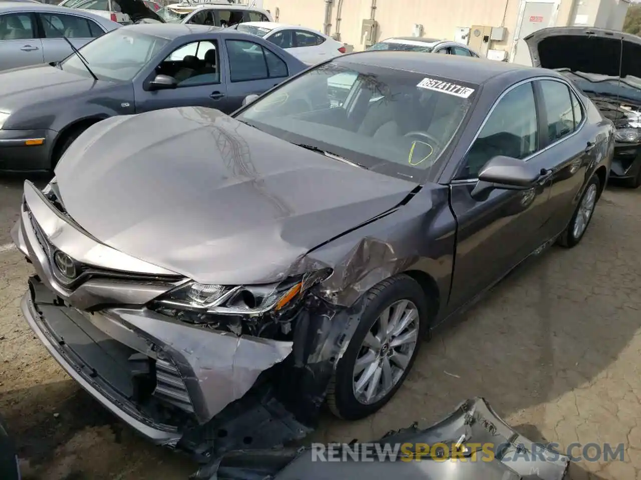 2 Photograph of a damaged car 4T1B11HK2KU755305 TOYOTA CAMRY 2019