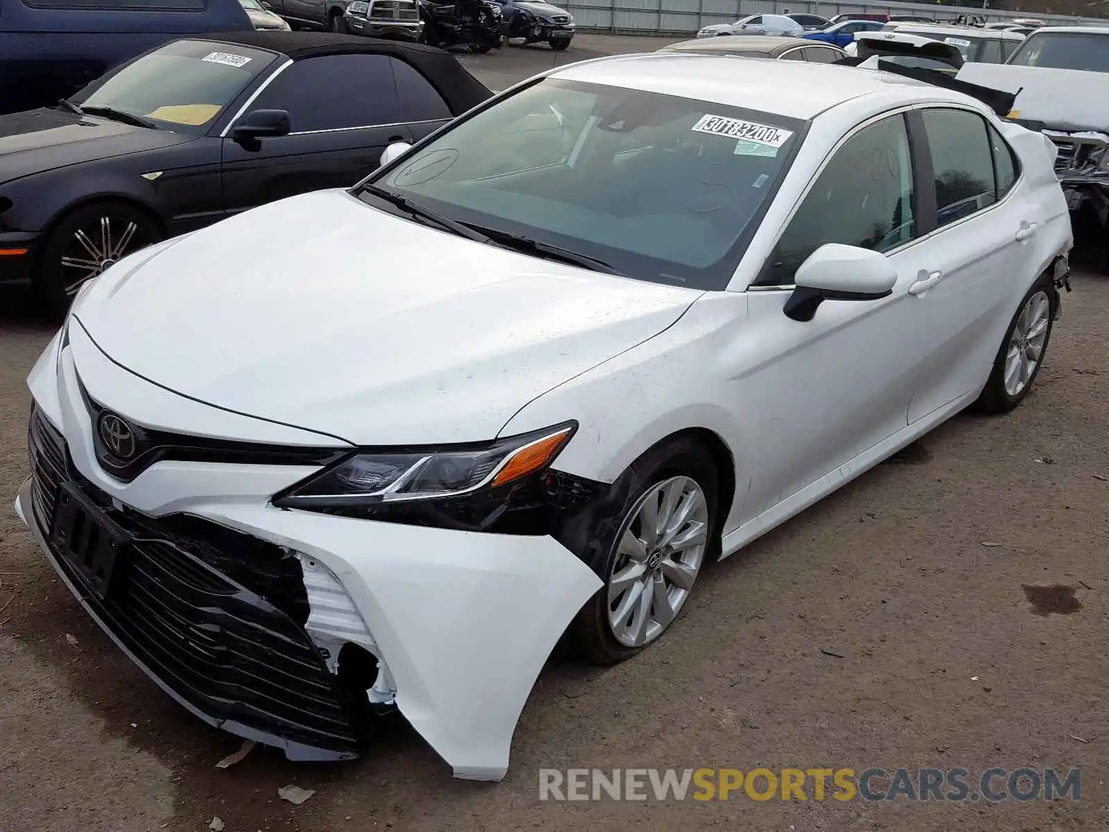 2 Photograph of a damaged car 4T1B11HK2KU756129 TOYOTA CAMRY 2019