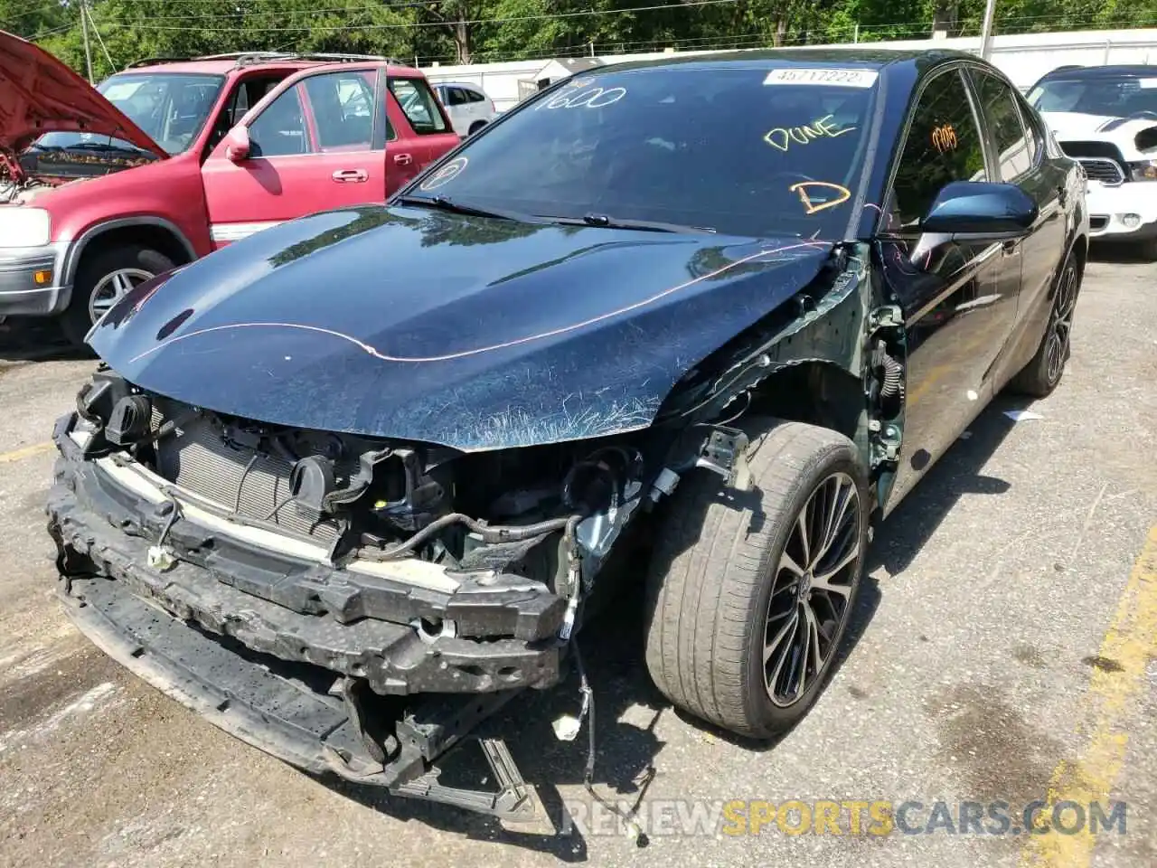 2 Photograph of a damaged car 4T1B11HK2KU757474 TOYOTA CAMRY 2019