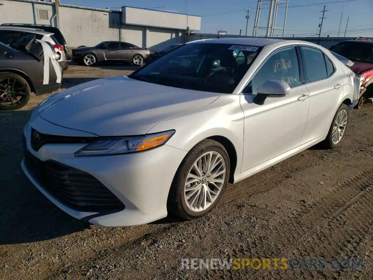 2 Photograph of a damaged car 4T1B11HK2KU758544 TOYOTA CAMRY 2019