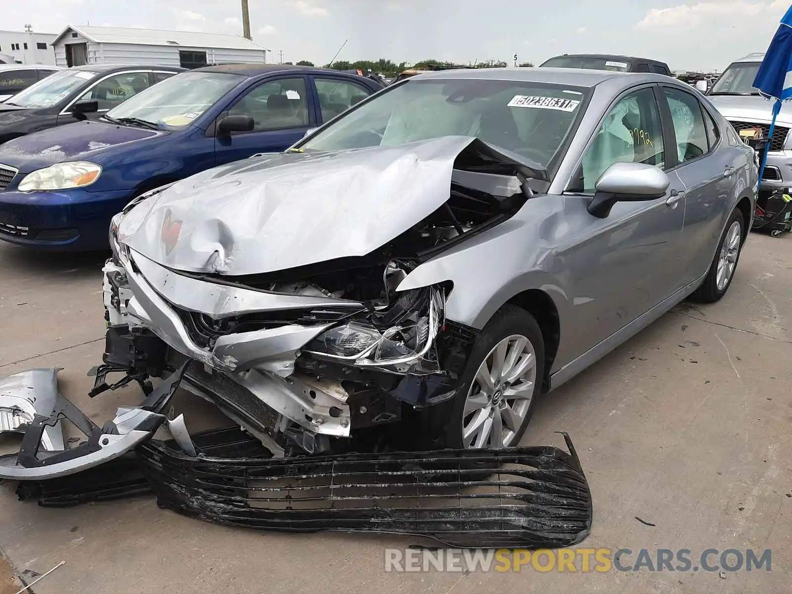 2 Photograph of a damaged car 4T1B11HK2KU760374 TOYOTA CAMRY 2019