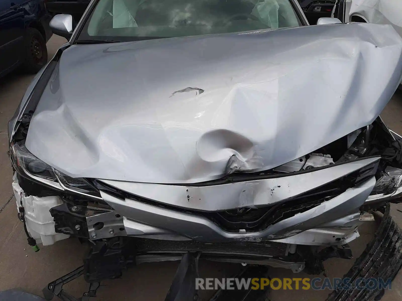 7 Photograph of a damaged car 4T1B11HK2KU760374 TOYOTA CAMRY 2019