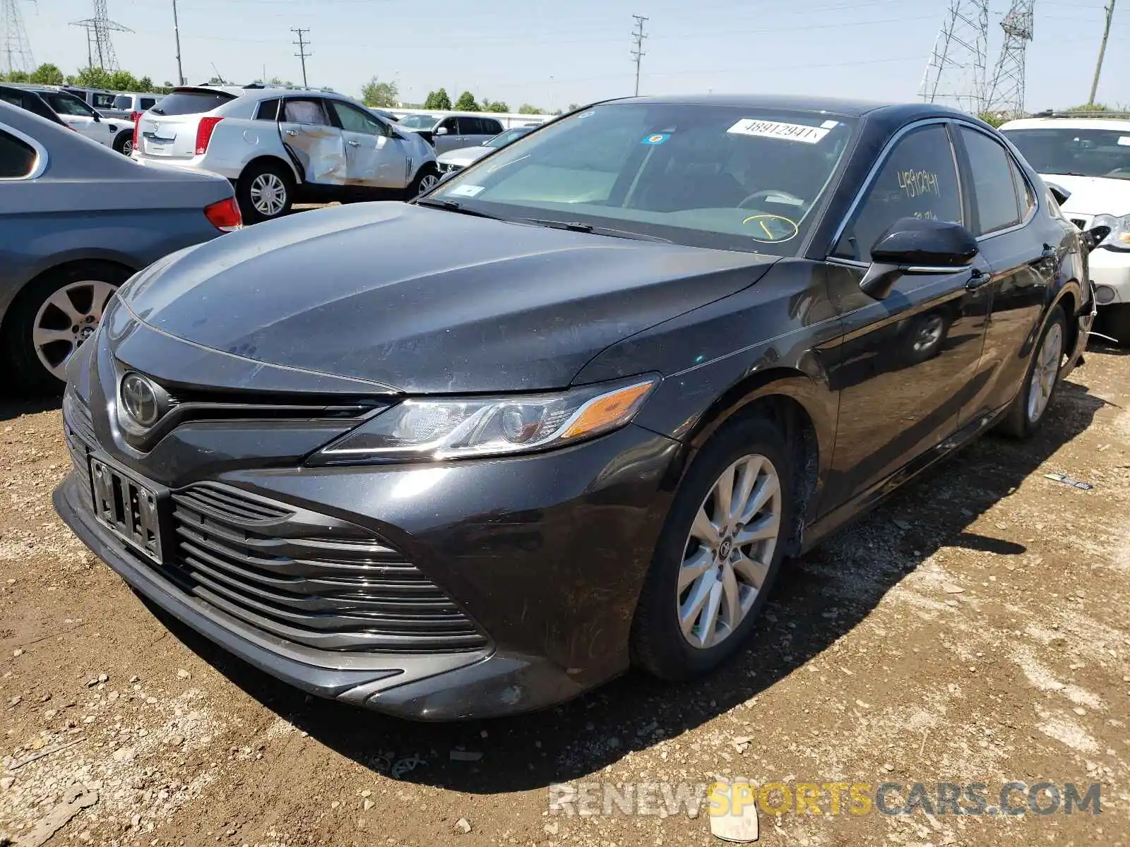 2 Photograph of a damaged car 4T1B11HK2KU765025 TOYOTA CAMRY 2019