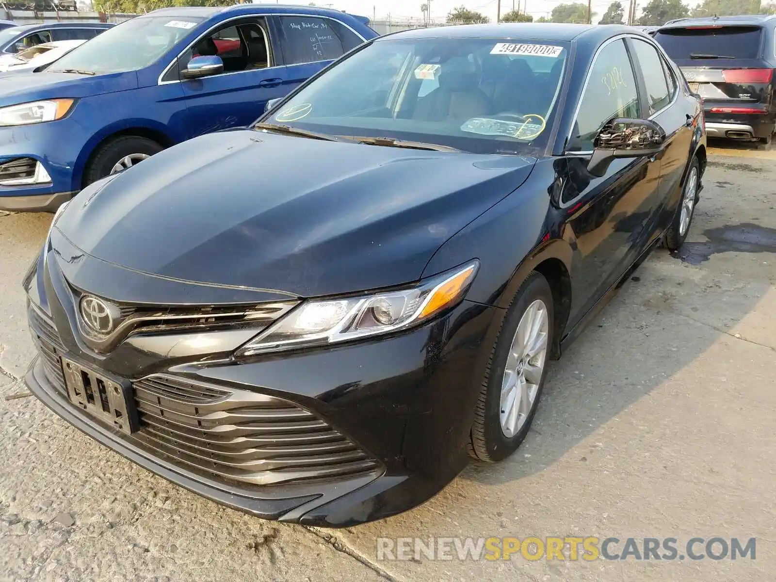 2 Photograph of a damaged car 4T1B11HK2KU766451 TOYOTA CAMRY 2019