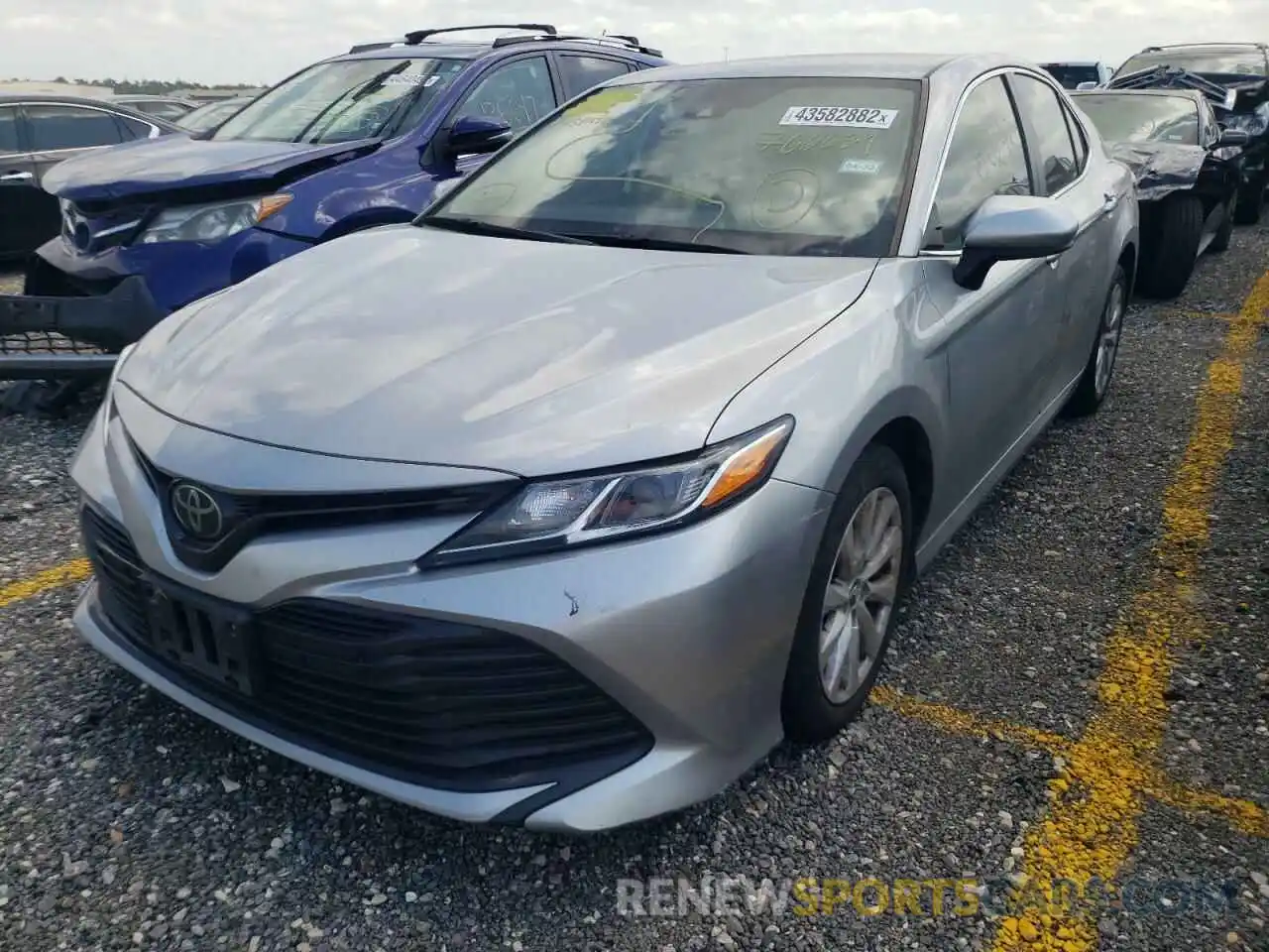 2 Photograph of a damaged car 4T1B11HK2KU766689 TOYOTA CAMRY 2019