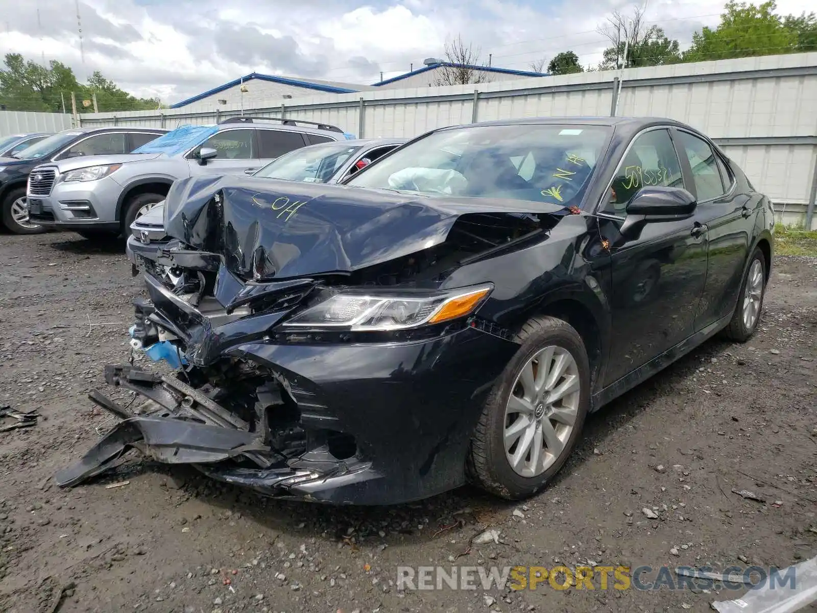 2 Photograph of a damaged car 4T1B11HK2KU767518 TOYOTA CAMRY 2019