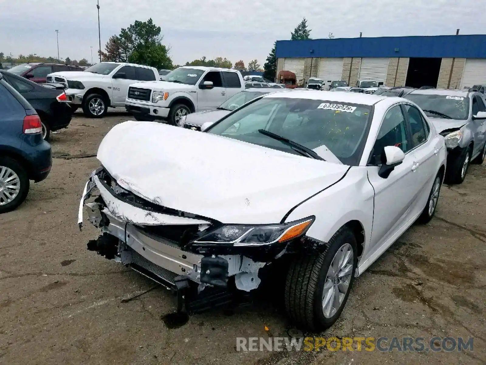 2 Photograph of a damaged car 4T1B11HK2KU769186 TOYOTA CAMRY 2019