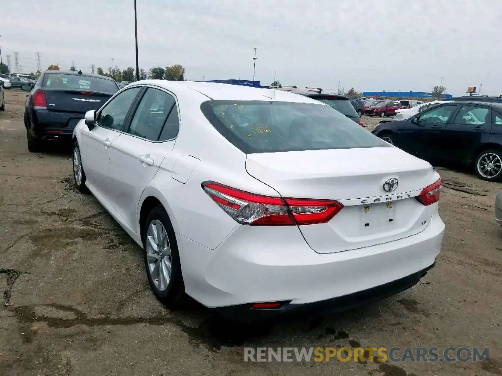 3 Photograph of a damaged car 4T1B11HK2KU769186 TOYOTA CAMRY 2019