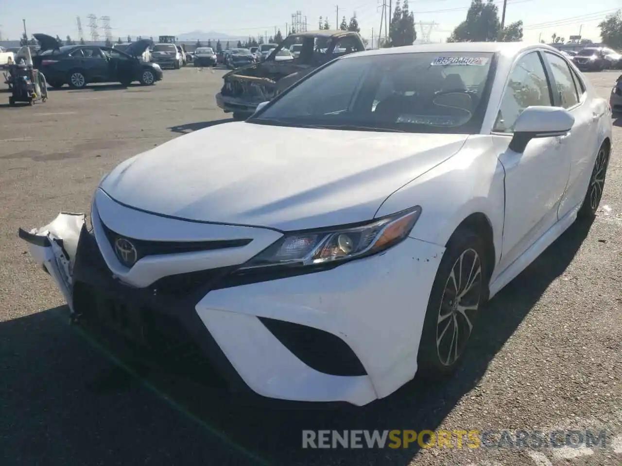 2 Photograph of a damaged car 4T1B11HK2KU770418 TOYOTA CAMRY 2019