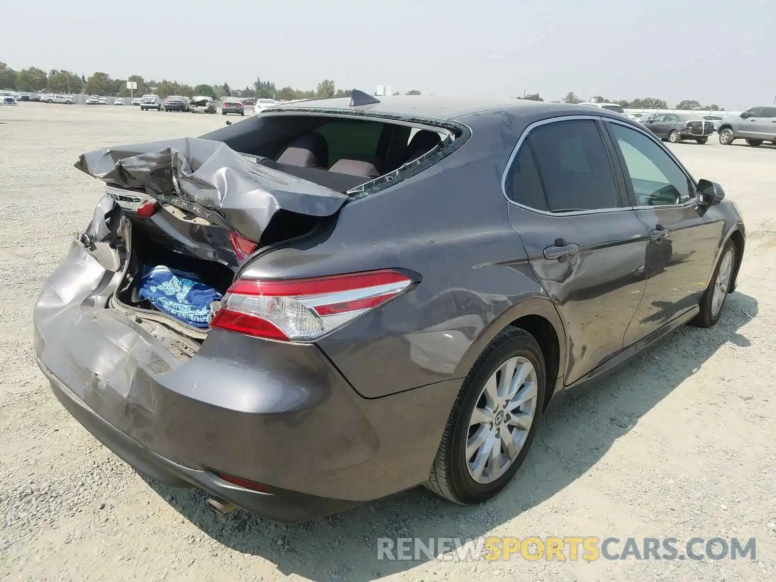 4 Photograph of a damaged car 4T1B11HK2KU770600 TOYOTA CAMRY 2019