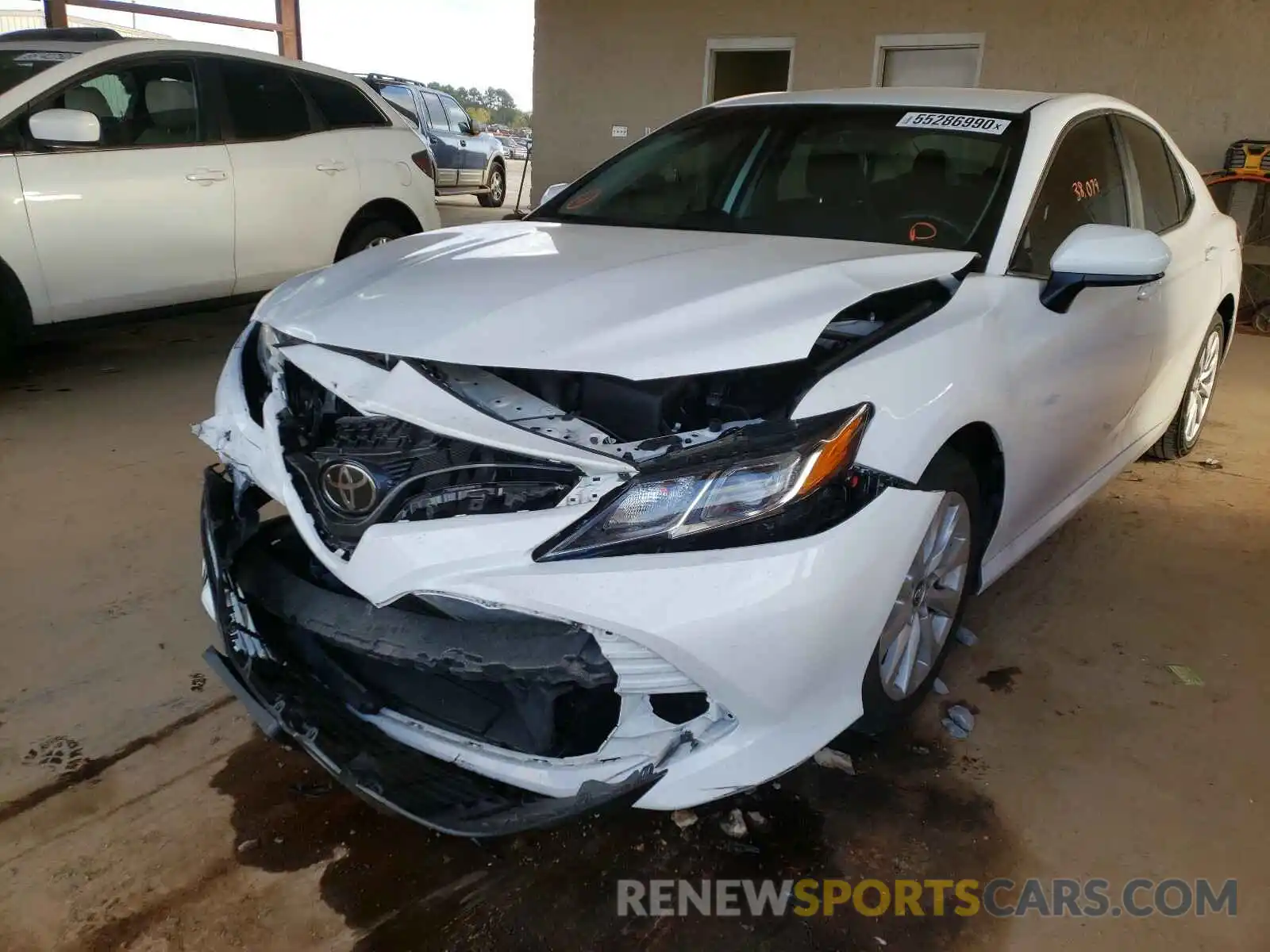 2 Photograph of a damaged car 4T1B11HK2KU772069 TOYOTA CAMRY 2019