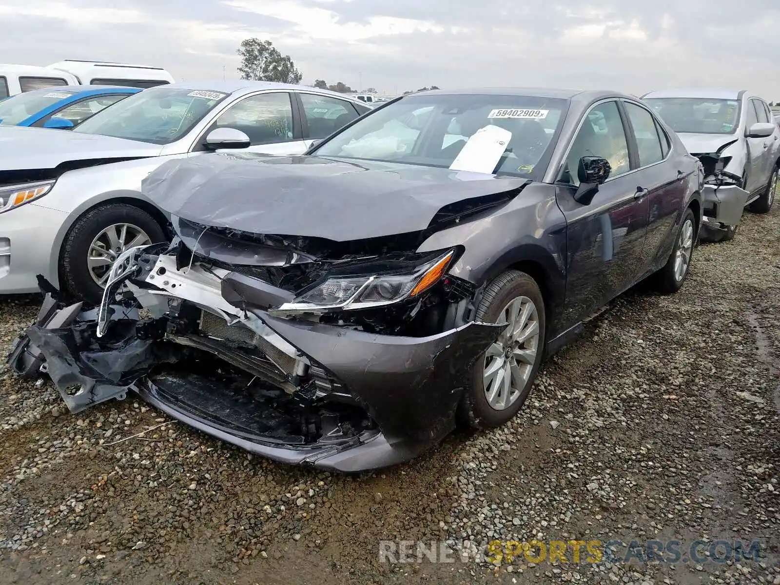 2 Photograph of a damaged car 4T1B11HK2KU773755 TOYOTA CAMRY 2019