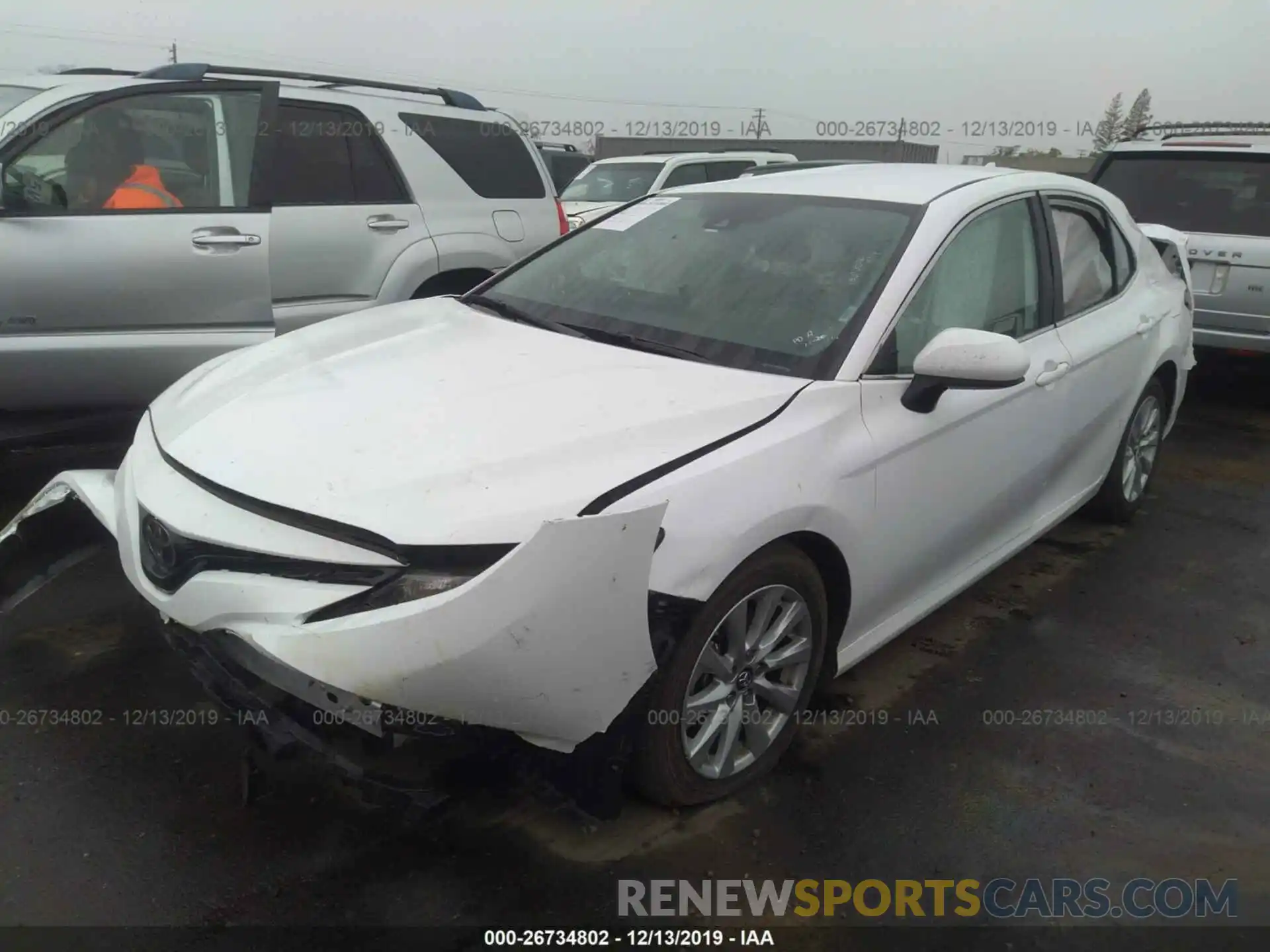 2 Photograph of a damaged car 4T1B11HK2KU774601 TOYOTA CAMRY 2019