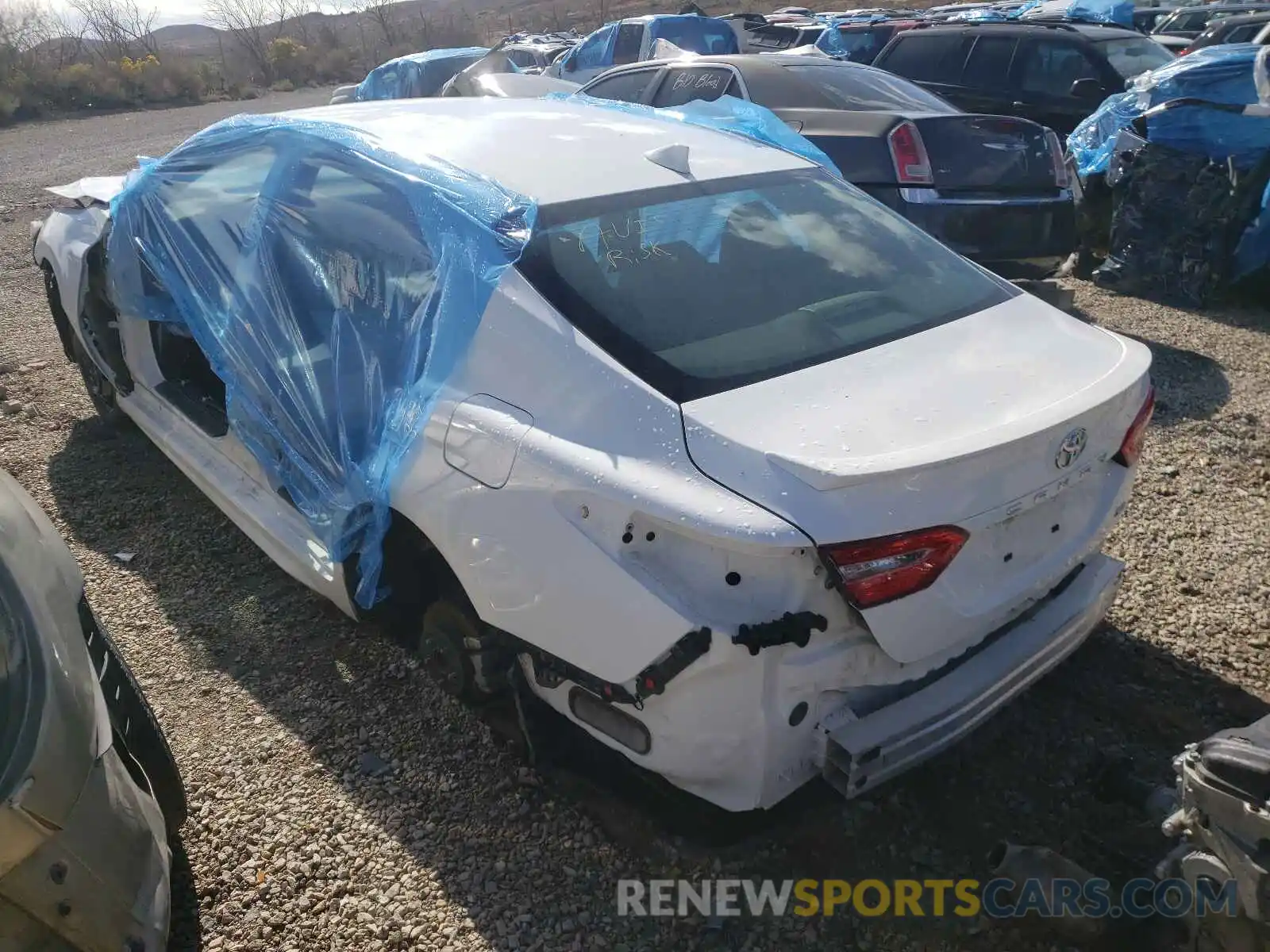 3 Photograph of a damaged car 4T1B11HK2KU775649 TOYOTA CAMRY 2019