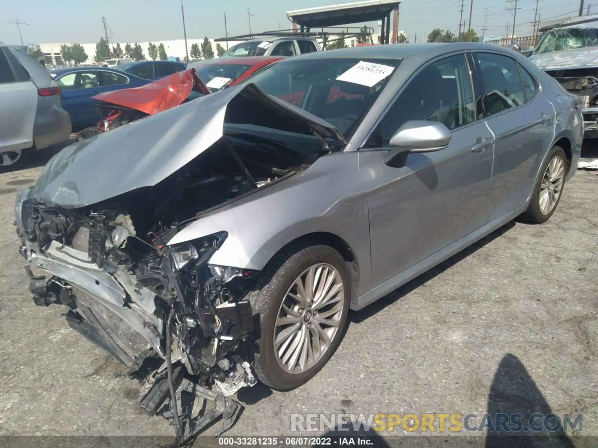 2 Photograph of a damaged car 4T1B11HK2KU783525 TOYOTA CAMRY 2019