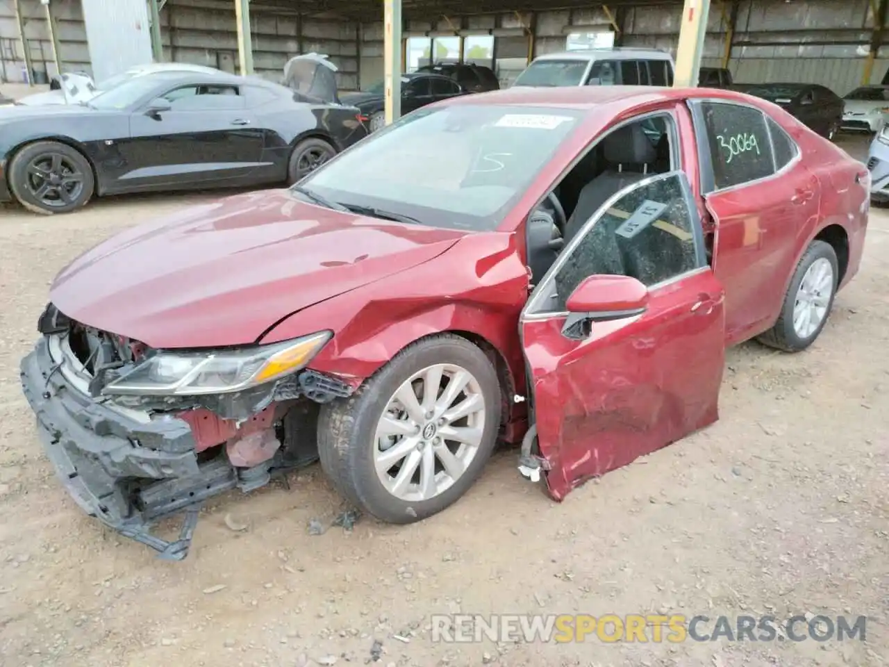 2 Photograph of a damaged car 4T1B11HK2KU786957 TOYOTA CAMRY 2019