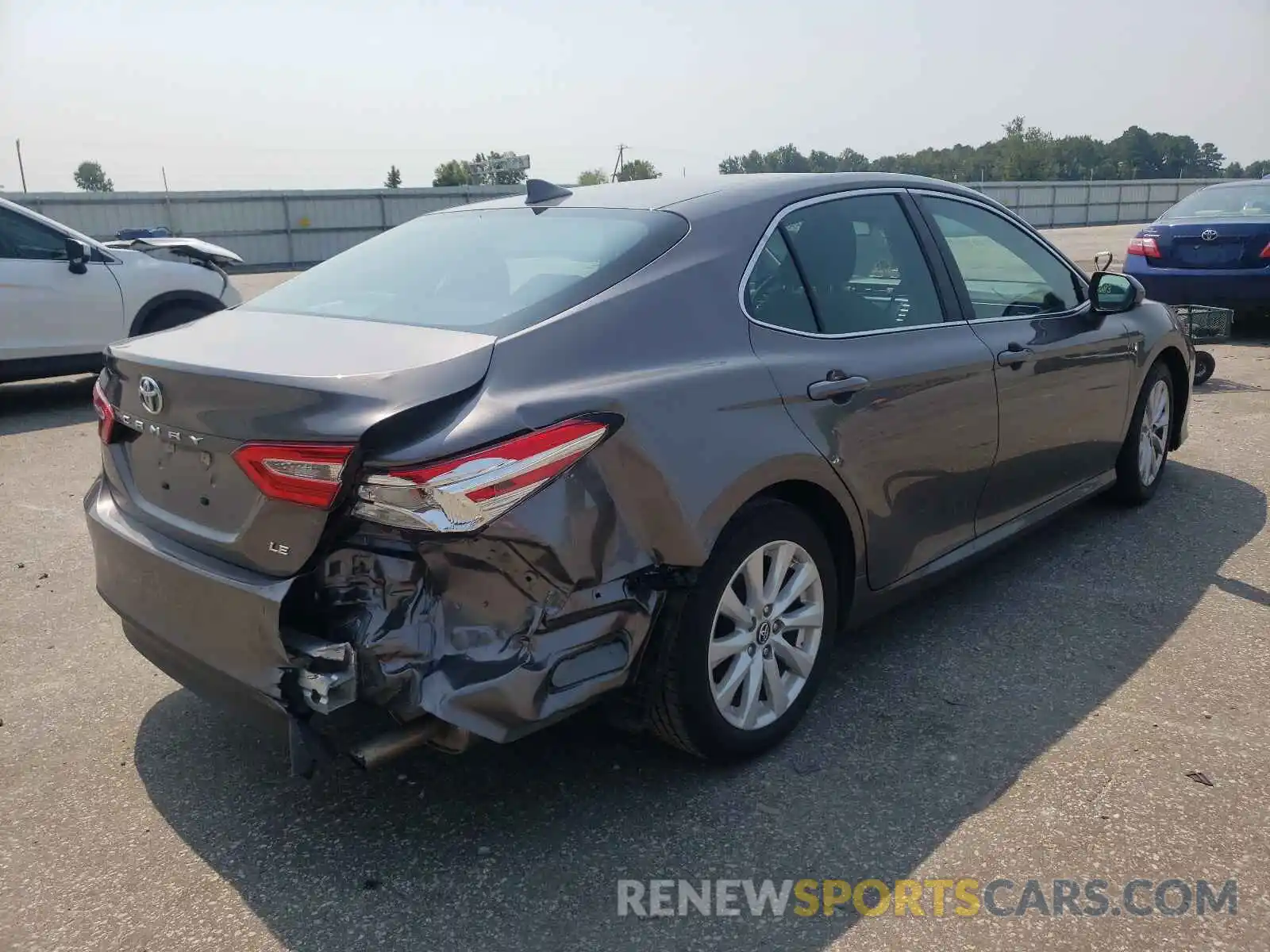 4 Photograph of a damaged car 4T1B11HK2KU787025 TOYOTA CAMRY 2019