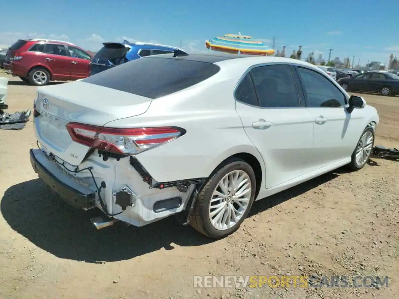 4 Photograph of a damaged car 4T1B11HK2KU787669 TOYOTA CAMRY 2019