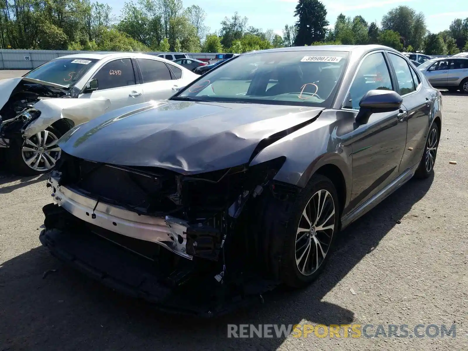 2 Photograph of a damaged car 4T1B11HK2KU788594 TOYOTA CAMRY 2019