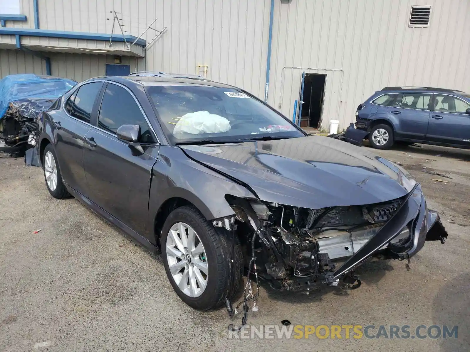 1 Photograph of a damaged car 4T1B11HK2KU791995 TOYOTA CAMRY 2019