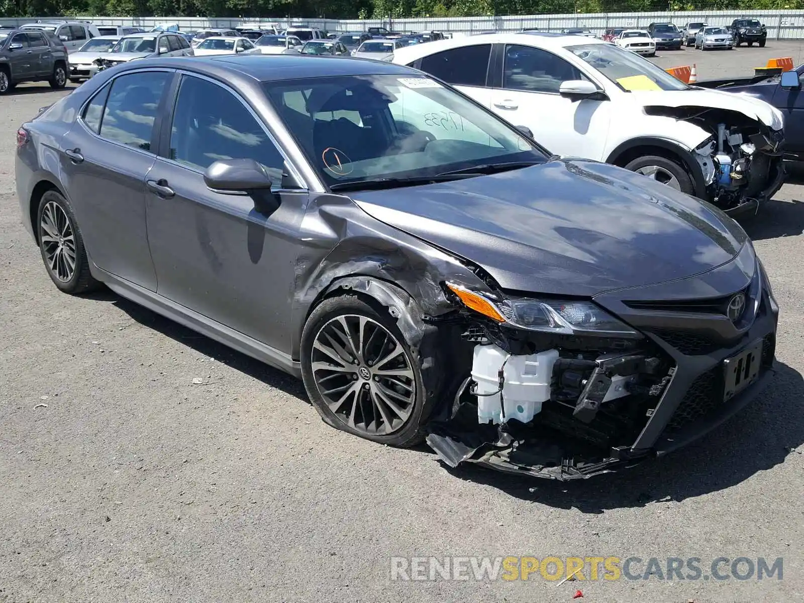 1 Photograph of a damaged car 4T1B11HK2KU801215 TOYOTA CAMRY 2019