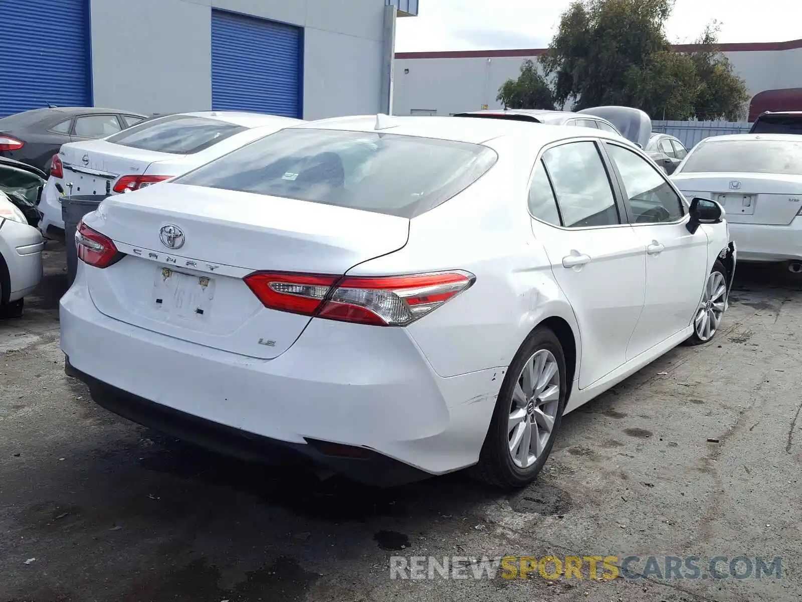 4 Photograph of a damaged car 4T1B11HK2KU801912 TOYOTA CAMRY 2019