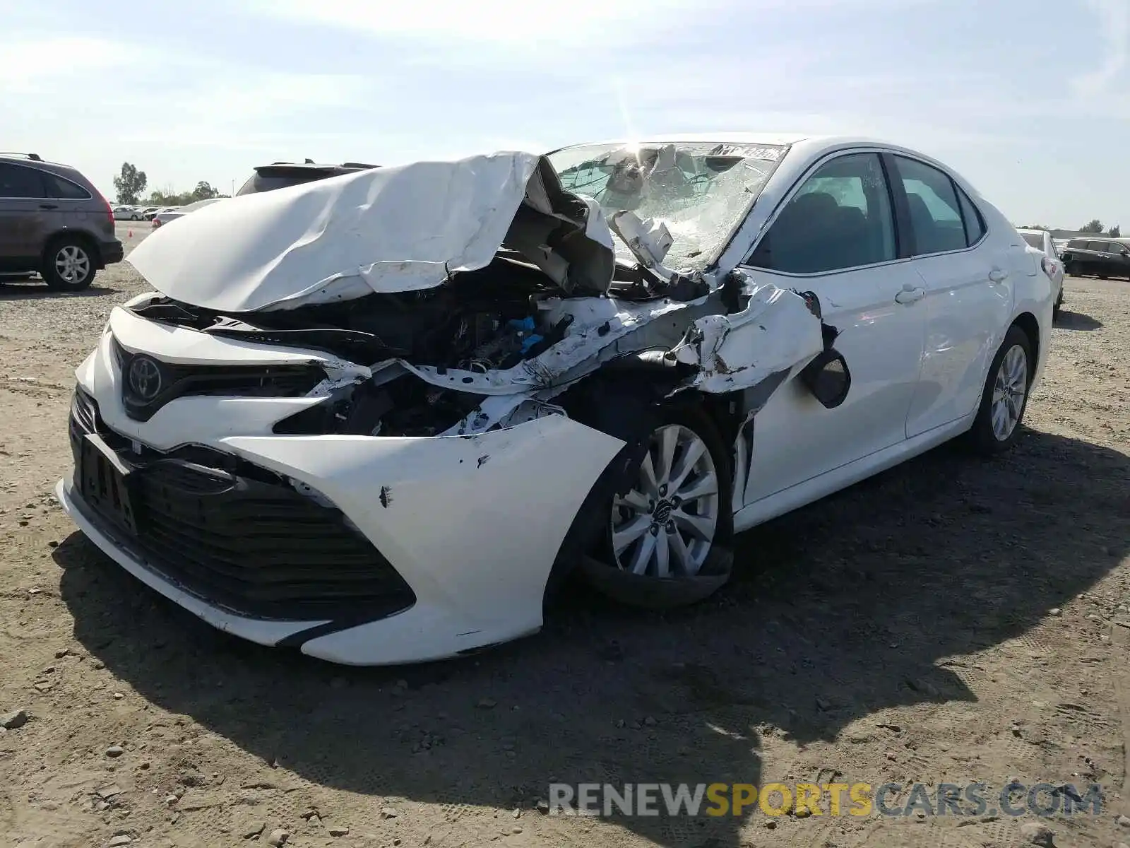 2 Photograph of a damaged car 4T1B11HK2KU801926 TOYOTA CAMRY 2019