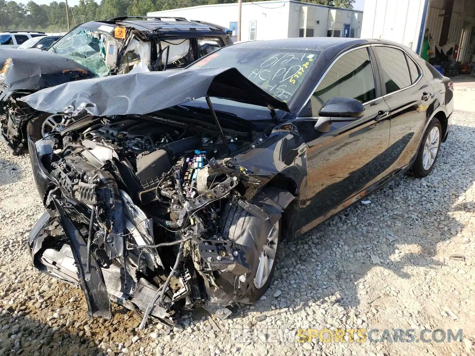 2 Photograph of a damaged car 4T1B11HK2KU809038 TOYOTA CAMRY 2019